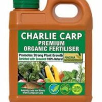 Plastic container of Charlie Carp Premium Organic Liquid Fertilizer Concentrate 1L. Promotes strong plant growth, enriched with seaweed, 100% natural, and NASAA certified organic.