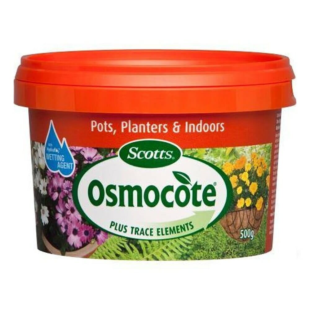 A tub of Osmocote Controlled Release Fertiliser: Pots, Planters & Indoors 500g, perfect for use in pots, planters, and indoors. The packaging is predominantly red with vibrant images of flowers.