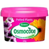 A 500g pack of Osmocote Controlled Release Fertiliser: Potted Plants displays vibrant flowers on its label.