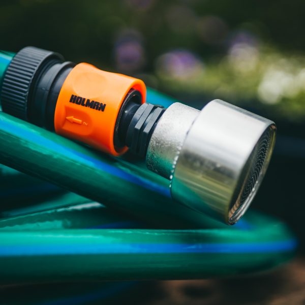 Garden Hose Complete Set with Adaptors and Shower head rosette. Blue garden plant hose with orange adaptor and silver shower watering rosette head