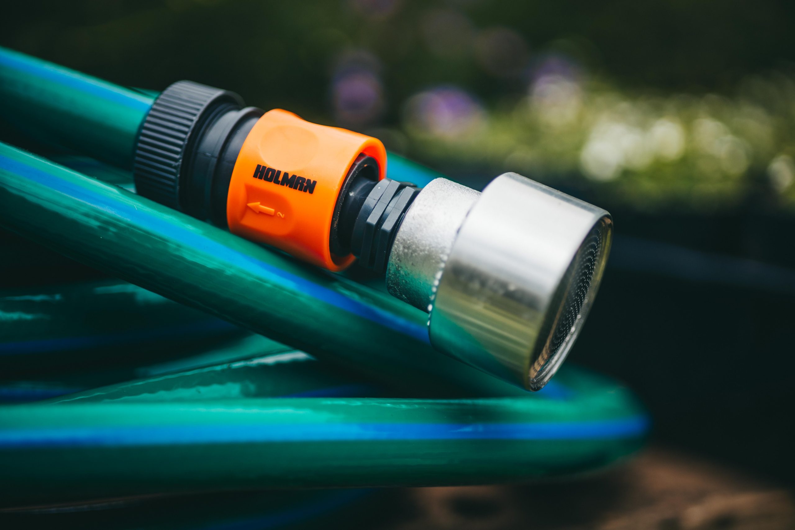 Garden Hose Complete Set with Adaptors and Shower head rosette. Blue garden plant hose with orange adaptor and silver shower watering rosette head