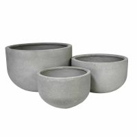 A collection of UrbanCrete Deep Bowl Cement S 70x61cm planters.