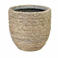 Introducing the Urban Grass Cylinder Grass 15x15cm, a stylish and lightweight alternative to traditional pots, featuring a large round design with an urban-inspired woven natural fiber exterior and an open top.