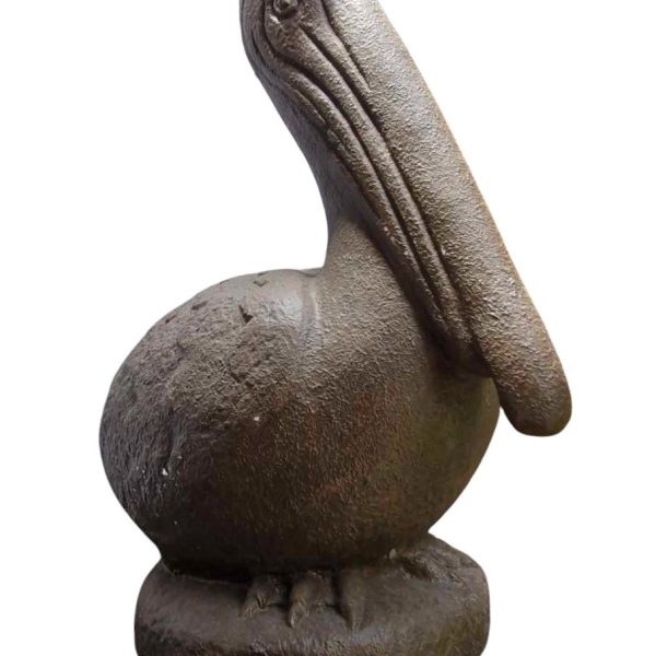 The Iridami Small Pelican Rustiq sculpture (30x64x54cm) in white stone exudes tranquility with its large beak and round body, echoing the elegance of Iridami reliefs and capturing Dewi Sri's serene essence.