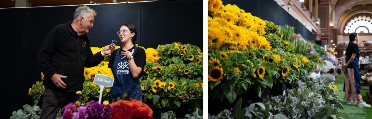 Two people engage in conversation near a vibrant display of sunflowers and other flowers, highlighting the many benefits of gardening. A sign reads "50% Sale," while another person strolls in the background past more floral arrangements.