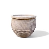 The Antique Terracotta Ribbed Bowl Planter Basalt S (53x45cm) features a round, beige design with a wide rim and horizontal ridges near the base, shown against a white background.