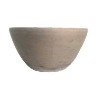 A plain, round, beige clay bowl with a smooth surface and slightly rough texture, photographed against a white background.