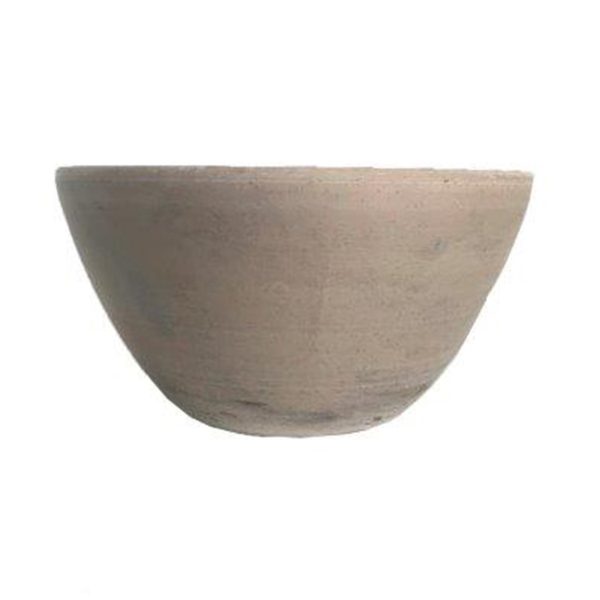 A plain, round, beige clay bowl with a smooth surface and slightly rough texture, photographed against a white background.