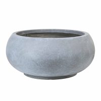 Round, wide, grey concrete planter with a smooth, matte finish, featuring a low profile and a circular opening at the top.