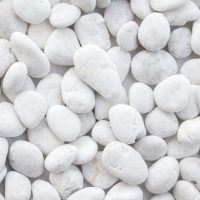 Pebbles Snow White 10-30mm 20kg Bag features smoothly polished pebbles in varying sizes, closely arranged for a refined look.