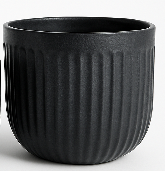 A matt black ceramic planter with vertical ridges, shown empty against a plain background.