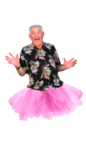 Older man wearing a floral shirt and a pink tutu, smiling broadly with arms raised, celebrates in style—could he be this happy about a Plant Pot Sale? All set against a plain background.