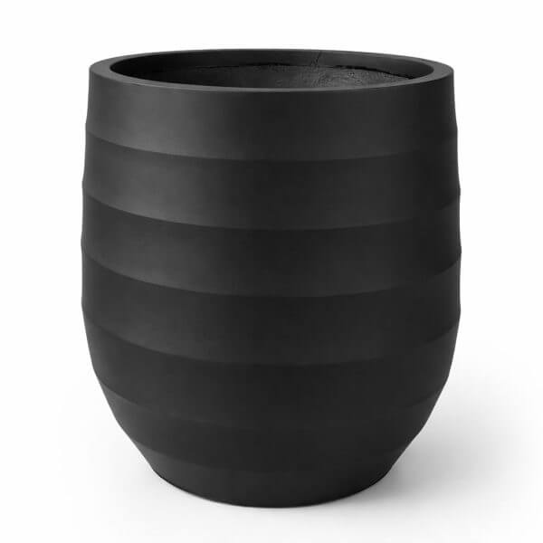 The GardenLite Seychelles Congo Black planter (L, 52x56cm) features a round, ribbed design with a matt black finish, shown against a white background.